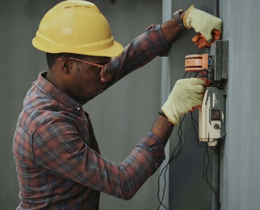 Tradesman completing wire change